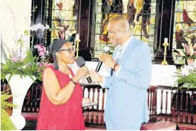  ?? ?? Pam Hall (left) and DiMario McDowell perform a musical tribute at the thanksgivi­ng service held on Wednesday for Karen Smith.