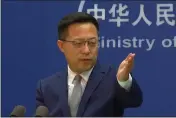  ?? LIU ZHENG — THE ASSOCIATED PRESS ?? In this image from video, Chinese Foreign Ministry spokespers­on Zhao Lijian holds a media briefing at the Ministry of Foreign Affairs office in Beijing on Wednesday.