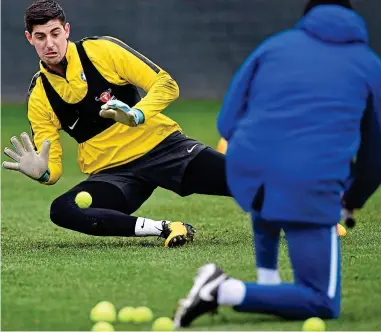  ?? GETTY IMAGES ?? Advantage Mr Courtois: Chelsea goalkeeper Thibaut Courtois is put through a drill with tennis balls in training yesterday ahead of the clash with Leicester