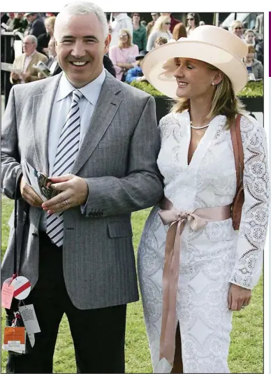  ??  ?? Top form: Seán Dunne with wife Gayle Killilea at the races in 2006
