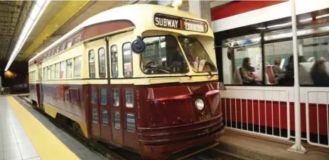  ?? RENÉ JOHNSTON PHOTOS/TORONTO STAR ?? The TTC’s vintage streetcar takes its first journey of the season along Queens Quay. It will run every Sunday until Labour Day.