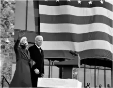  ?? AP Photo/Evan Vucci ?? President-elect Joe Biden stands with his wife Jill Biden after speaking at the Major Joseph R. “Beau” Biden II National Guard/Reserve Center, on Tuesday, in New Castle, Del.