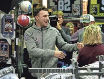  ?? ERIC SEALS, USA TODAY SPORTS ?? Fans paid $99 to get an autograph from Johnny Manziel at an event in Katy, Texas, in February.