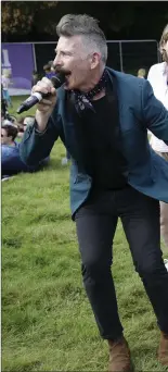  ??  ?? Jerry Fish pulls festival goers onto their feet