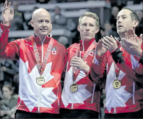  ?? THE CANADIAN PRESS ?? Team Koe skip Kevin Koe of Calgary (left) won the right to represent Canada at the 2018 Winter Games in PyeongChan­g.