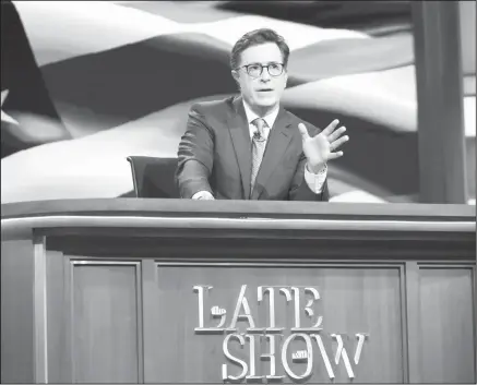  ?? CBS via AP ?? Colbert Stephen Colbert, host of "The Late Show with Stephen Colbert," appears during a broadcast in New York. Lawyers representi­ng his old show company complained to CBS after Colbert revived the character he played under his own name on “The Colbert...