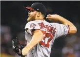  ?? Ross D. Franklin / Associated Press ?? Washington’s Stephen Strasburg left his outing Sunday after two innings with forearm discomfort, but might not miss a start.