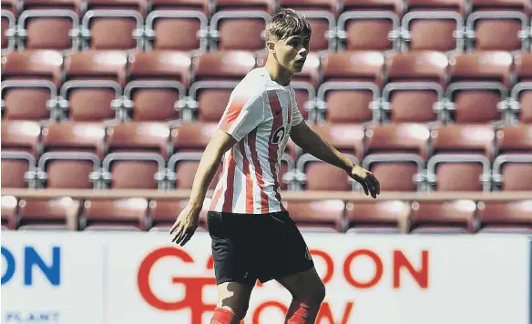  ??  ?? Callum Doyle had the right answers to a lot of questions on his Sunderland debut against Hearts. Picture by Frank Reid