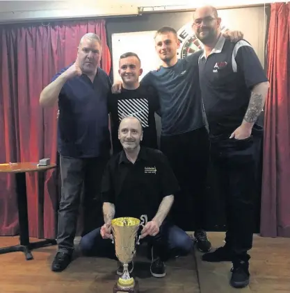  ??  ?? From left to right: Karl Windisch, Luke Littler, Leon Littler, Terry Roach and Sean Bell with the cup 2019/20 winners of the Hatton Cup played at the Widnes Bowling Club on Monday night