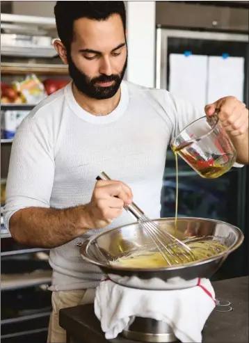  ?? GRAYDON HERRIOTT ?? Former Bon Appetit editor and Chez Panisse alum Andy Baraghani draws on his Persian roots and and veg-forward dishes in his new cookbook, “The Cook You Want to Be: Everyday Recipes to Impress.”