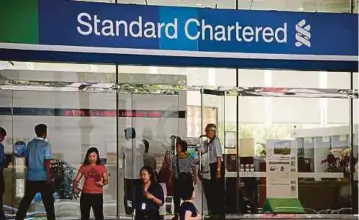  ?? BLOOMBERG PIC ?? Standard Chartered has launched an internal investigat­ion into whether it adequately scrutinise­d the source of the customers’ funds and performed the appropriat­e ‘know your client’ due diligence.