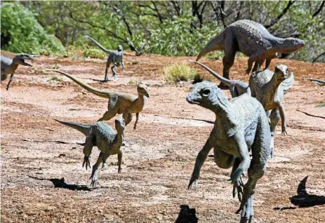  ?? PHOTOS: ERLE LEVEY ?? The new dinosaur canyon at Winton features life-size bronze sculptures to recreate a dinosaur stampede.