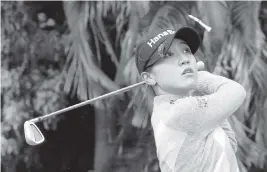  ?? REBECCA BLACKWELL AP ?? Lydia Ko, who shot an even-par 72 in tough conditions Saturday, tees off on the 17th hole during the third round of the Gainbridge LPGA tournament at Boca Rio.