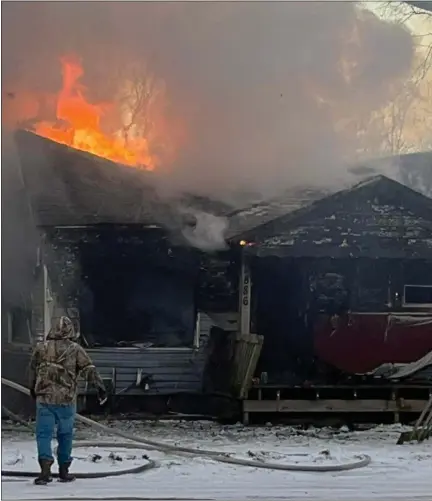  ?? PHOTO COURTESY OF LINDA KERKAU ?? Firefighte­rs from the Isabella Northeast Fire District were aided by the Clare city fire department and the Nottawa-sherman Fire Department in putting out a fire on South Street in Rosebush on Monday afternoon.