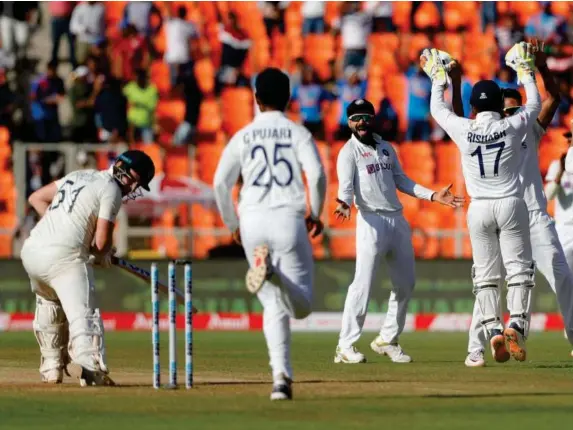  ?? (ECB) ?? India celebrate the wicket of Jonny Bairstow