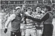  ?? NICK TURCHIARO USA TODAY Sports ?? Sporting Kansas City midfielder Jake Davis (17) celebrates with teammates after scoring a goal against Toronto FC at BMO Field on March 30, 2024.