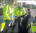  ??  ?? Home secretary Priti Patel speaks to police officers