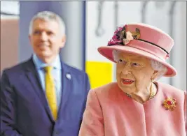  ?? Ben Stansall The Associated Press ?? Britain’s Queen Elizabeth II visits the Defence Science and Technology Laboratory at Porton Down, near Salisbury, England, on Thursday.