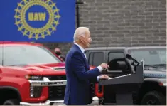  ?? ( Leah Millis/ Reuters) ?? SPEAKING IN front of a backdrop of American- made vehicles and a United Auto Workers sign, Democratic US presidenti­al nominee Joe Biden speaks about new proposals to protect US jobs during a campaign stop in Warren, Michigan last month.