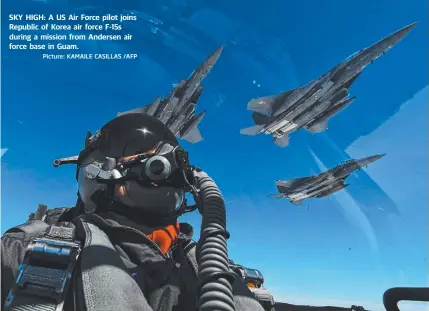  ?? Picture: KAMAILE CASILLAS /AFP ?? SKY HIGH: A US Air Force pilot joins Republic of Korea air force F-15s during a mission from Andersen air force base in Guam.