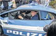  ??  ?? Lamborghin­i CEO Stefano Domenicali handed the vehicle over to the police.