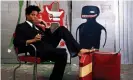  ??  ?? Jean-Michel Basquiat poses with his art in 1985. Photograph: Lizzie Himmel/AP