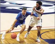  ?? David Butler II / Associated Press ?? Although he missed two key free throws near the end of regulation, UConn’s R.J. Cole tied up Creighton star Marcus Zegarowski all game on Sunday, then took accountabi­lity for his missed free throws afterwards on Twitter.