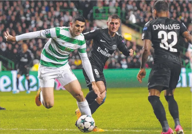  ?? Picture: AFP PHOTO ?? PRIMED: Socceroos star Tom Rogic in action for Celtic against Paris Saint-Germain in Glasgow last month.