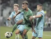  ?? Thibault Camus Associated Press ?? DENIS BOUANGA, center, is in the prime of his career and adds another offensive threat to LAFC.