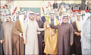  ?? KUNA photo ?? Minister of Informatio­n and Minister of State for Youth Affairs Mohammad Al-Jabri during the 19th KuwaitInte­rnational Camel Racing Championsh­ip.