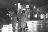  ?? JOHN J. KIM/CHICAGO TRIBUNE ?? A group of children view a crime scene in the 3700 block of West 26th Street in Chicago, where a 7-yearold girl was shot while trick-or-treating Thursday.