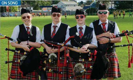  ??  ?? Lorraine Byrne, Therese O’Brien, Catriona Doyle and Michael O’Brien from the Michael Dwyer Pipe Band in Aughrim at the Junior B football final between Avoca and Enniskerry in Ashford.