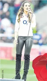  ??  ?? English soprano Laura Wright sings England’s national anthem before a game at Twickenham.