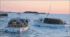  ?? FILE PHOTO ?? Fishing boats head out for the season opening last year in this file photo.