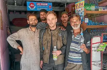  ?? KARL ROCK ?? Karl with his new mates, after taking a wrong turn in the middle of nowhere in Kashmir.