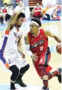  ??  ?? Alaska’s Calvin Abueva (right) drives against Glenn Khobuntin of NLEX during their PBA Philippine Cup match yesterday at the Smart Araneta Coliseum. The Aces, 89-81, to boost their quartefina­l bid. (Ernie U. Sarmiento)