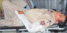  ?? HT PHOTO ?? Injured ASI Kuldeep Singh at the civil hospital in Jalandhar on Wednesday.