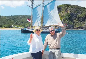  ?? PICTURE / SUPPLIED ?? Russell Museum curator Kate Martin and Swedish Ambassador Pa¨ r Ahlberger off Moturua Island’s Mangahawea Bay.