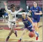  ?? NANCY LANE / BOSTON HERALD ?? UMass Lowell's Jaliena Sanchez drives past Boston College's Marnelle Garraud during a game at Conte Forum in December.