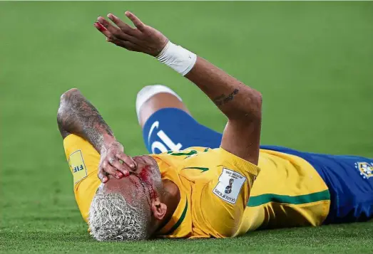  ?? — EPA ?? Ouch!: Brazil’s Neymar gets injured after colliding with Bolivia’s George Duk during their World Cup qualifier at the Arena das Dunas Stadium in Natal on Thursday.