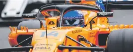  ??  ?? QUESTIONAB­LE. Fernando Alonso was forced off the tarmac by Lance Stroll and then penalised for regaining said tarmac ahead of his rival.