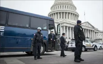 ?? Sarah Silbiger/The New York Times ?? An Air Force bus for members of House Speaker Nancy Pelosi’s congressio­nal travel delegation waits Thursday outside the Capitol in Washington.
