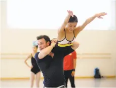  ?? Erik Tomasson 2016 ?? Liam Scarlett rehearses with Yuan Yuan Tan in his “Fearful Symmetries,” which tied for an outstandin­g choreograp­hy Izzie.