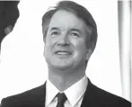  ?? Associated Press ?? ■ Supreme Court nominee Brett Kavanaugh smiles July 11 during a meeting with Sen. Orrin Hatch, R-Utah, on Capitol Hill in Washington. Kavanaugh, a judge for the last 12 years on the federal appeals court for the District of Columbia, has a long record of slapping back Environmen­tal Protection Agency regulation­s.