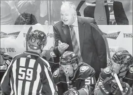  ?? Debora Robinson NHLI ?? RANDY CARLYLE, the winningest coach in Ducks history with a record of 430293-96 including the playoffs, couldn’t survive this spiraling season.