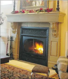  ?? Postmedia News ?? A fireplace — whether wood, gas or another option — enhances the decor and warmth
of a room, but must be properly used and maintained to ensure safety.