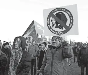  ?? BRUCE KLUCKHOHN/AP ?? Native American leaders protest against the Redskins team name outside U.S. Bank Stadium before a game Oct. 24, 2019, between Washington and the Vikings in Minneapoli­s.