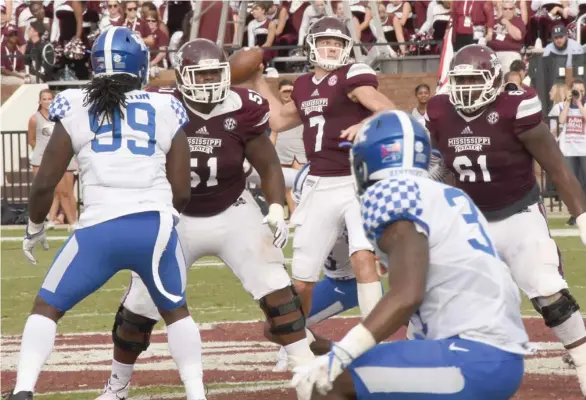  ?? (Photo by Jason Cleveland, SDN) ?? Mississipp­i State quarterbac­k Nick Fitzgerald (7) drops back to pass against Kentucky earlier this season.