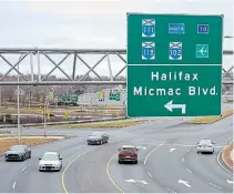  ?? ANDREW VAUGHAN THE CANADIAN PRESS ?? A road sign directs traffic heading to Micmac Boulevard in Dartmouth, N.S. “Micmac is redundant and it’s been redundant for a long time,” says Daniel Paul, a Mi’kmaq elder.