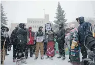  ?? DEREK MORTENSEN/The StarPhoeni­x ?? The 2nd Annual Memorial March for Missing and Murdered Indigenous Women and Girls on Saturday at city hall. City
leaders and marchers want an inquiry into the issue.